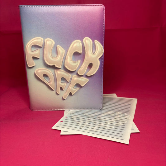 Purple and blue pearlescent ombre A5 faux leather binder with 'FUCK OFF' in white bubble letters arranged in a heart shape